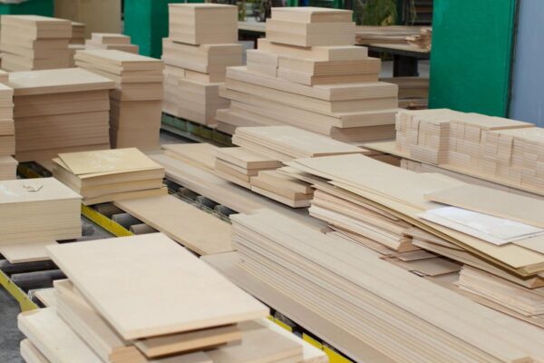 Stacked Piles of Sliced Plywood in Manufacturing Process
